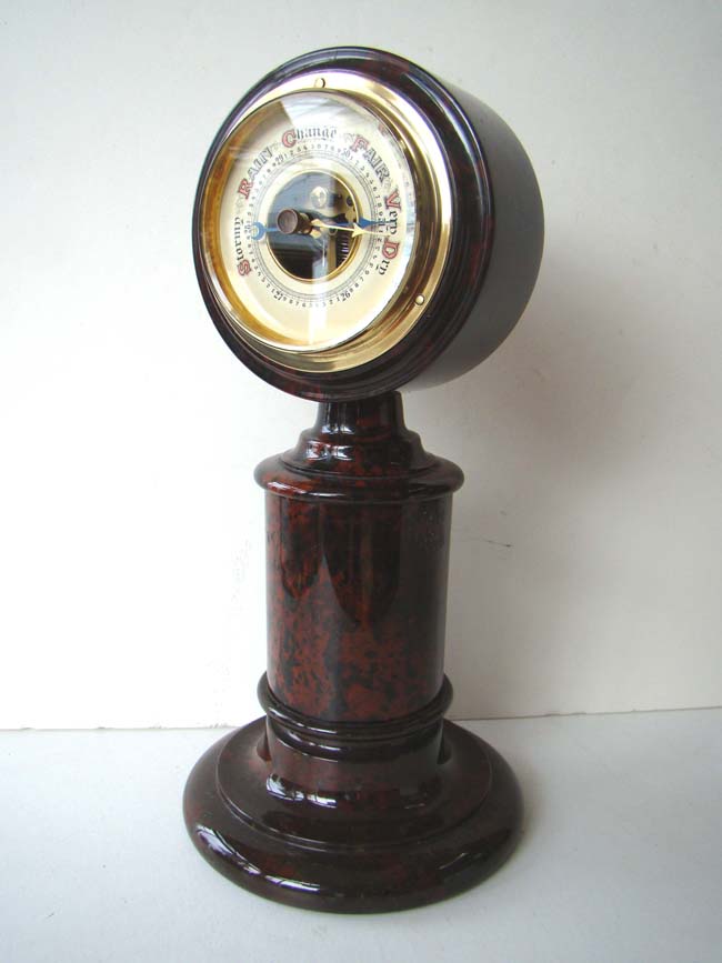 A French 19th century Aneroid Barometer mounted on a beautiful Marble column circa 1870